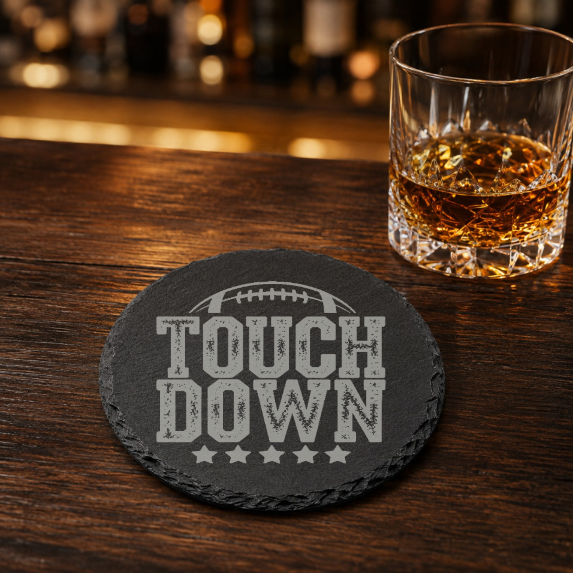Touchdown Football Slate Coaster — Dandelion Design Co. — SlateStudioMedia:gallery:21 — 0034-TFGN_touchdown_football_slate_coaster_08_round_whiskey_lifestyle.png