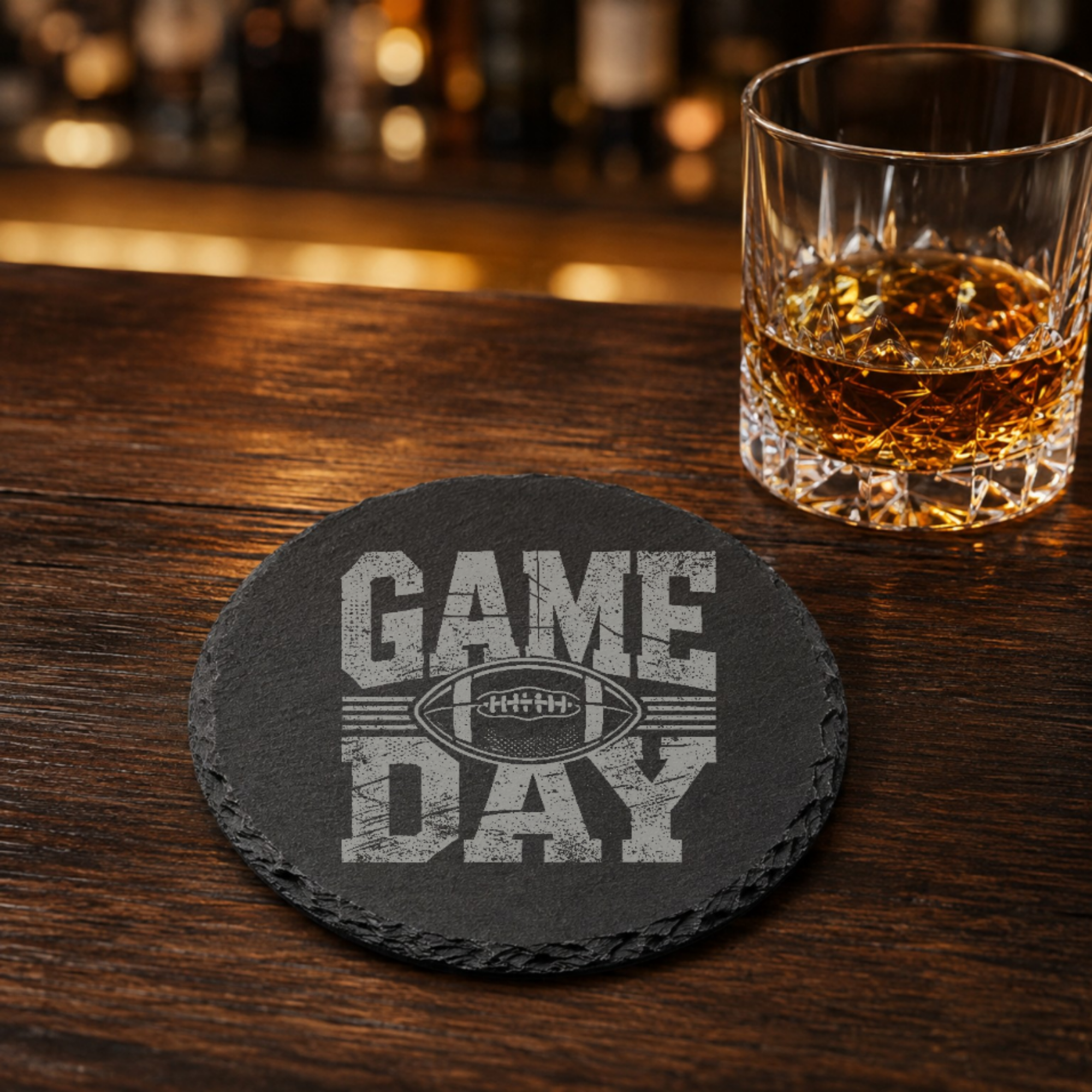 Touchdown Football Slate Coaster — Dandelion Design Co. — SlateStudioMedia:gallery:27 — 0034-TFGN_touchdown_football_slate_coaster_28_D04_round_whiskey_lifestyle.png