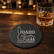 Idaho Slate Coasters 4x4 Laser Engraved Stone Drink Coasters Idaho Home Decor Gem State Established 1890 Gift — Dandelion Design Co. — SlateStudioMedia:gallery:21 — 0070-ISGN_idaho_slate_coasters_4x4_laser_engraved_stone_drink_coasters_idaho_home_decor_gem_state_established_1890_gift_08_round_whiskey_lifestyle.png
