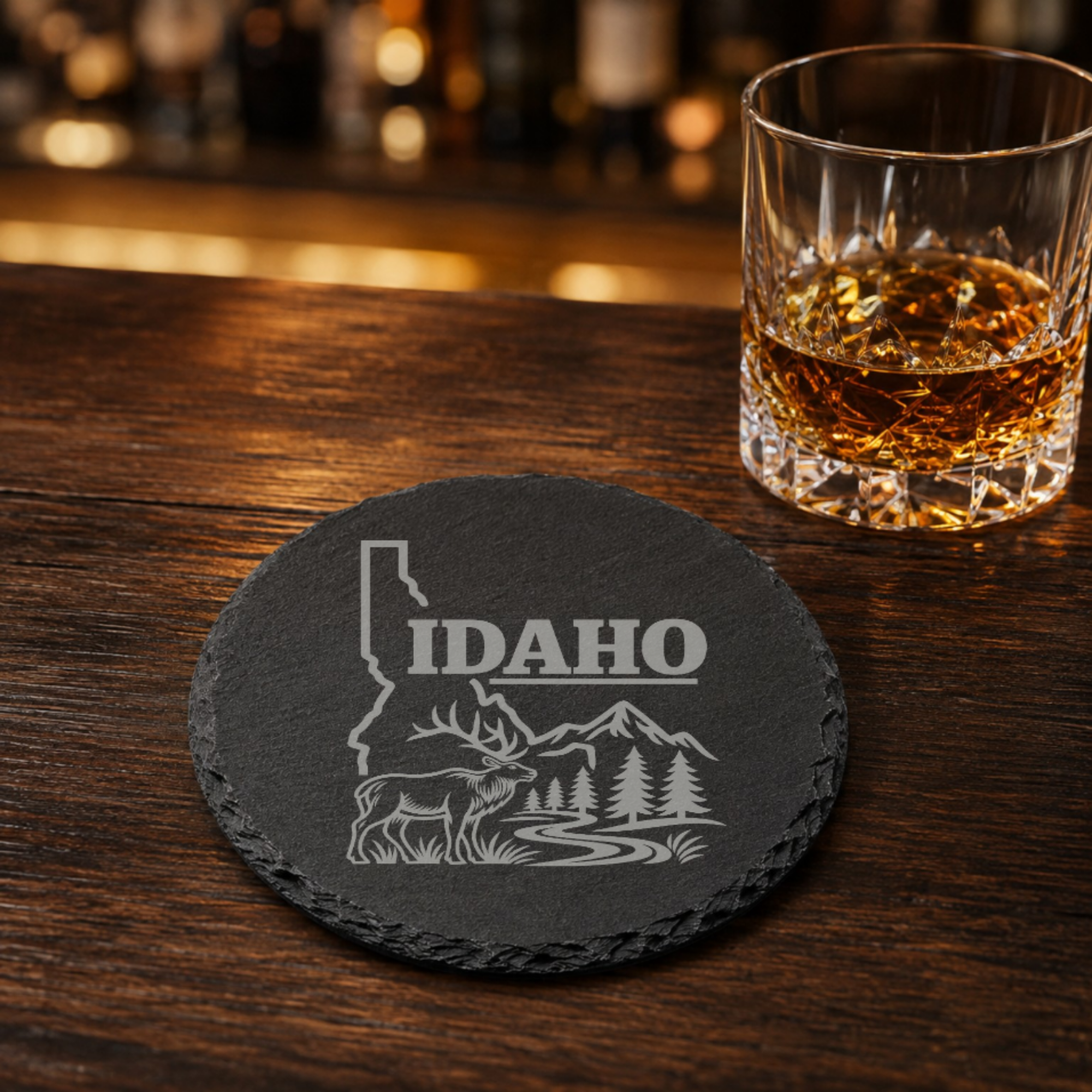 Idaho Slate Coasters 4x4 Laser Engraved Stone Drink Coasters Idaho Home Decor Gem State Established 1890 Gift — Dandelion Design Co. — SlateStudioMedia:gallery:21 — 0070-ISGN_idaho_slate_coasters_4x4_laser_engraved_stone_drink_coasters_idaho_home_decor_gem_state_established_1890_gift_08_round_whiskey_lifestyle.png