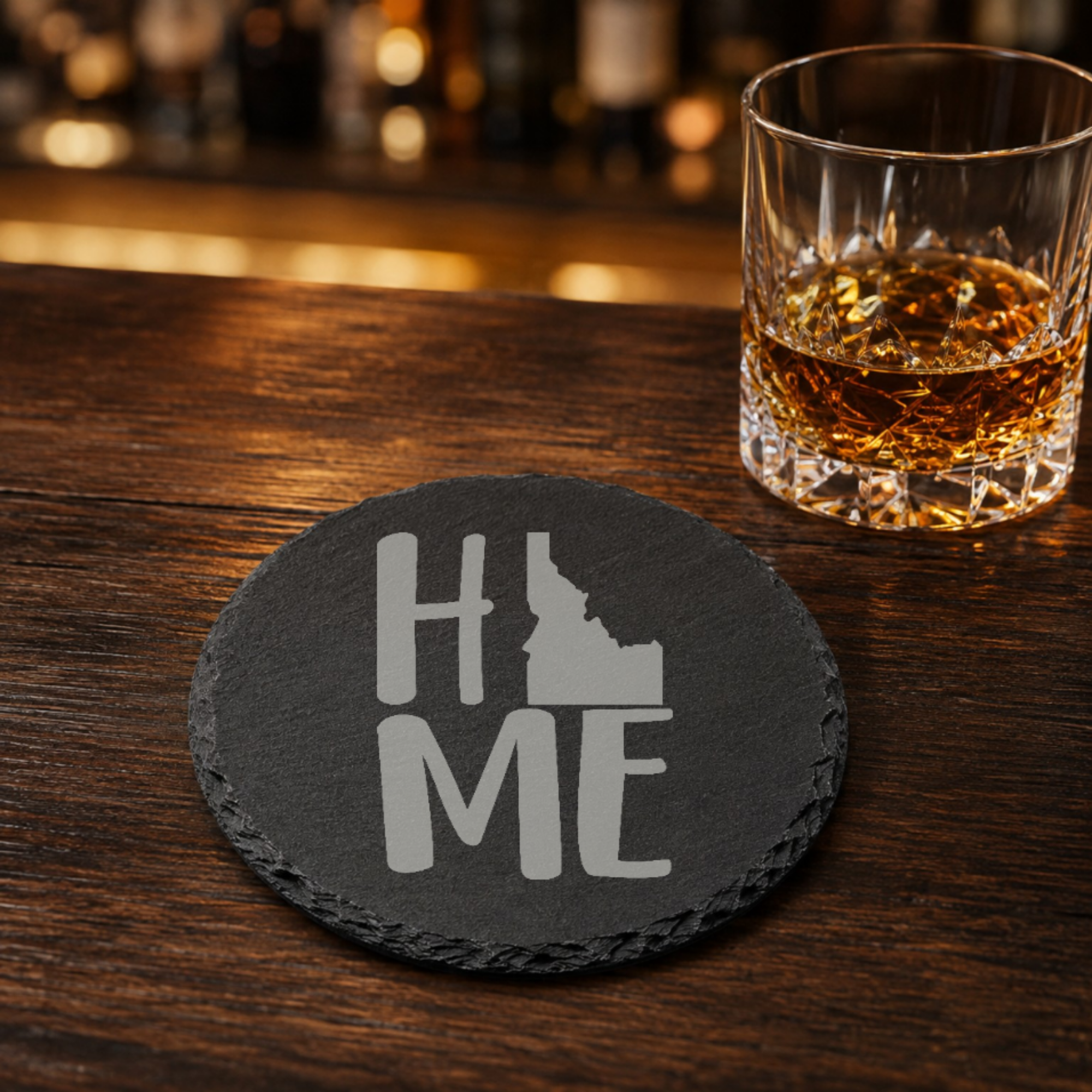 Idaho Slate Coasters 4x4 Laser Engraved Stone Drink Coasters Idaho Home Decor Gem State Established 1890 Gift — Dandelion Design Co. — SlateStudioMedia:gallery:28 — 0070-ISGN_idaho_slate_coasters_4x4_laser_engraved_stone_drink_coasters_idaho_home_decor_gem_state_established_1890_gift_28_D04_round_whiskey_lifestyle.png