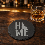 Idaho Slate Coasters 4x4 Laser Engraved Stone Drink Coasters Idaho Home Decor Gem State Established 1890 Gift — Dandelion Design Co. — SlateStudioMedia:gallery:27 — 0070-ISGN_idaho_slate_coasters_4x4_laser_engraved_stone_drink_coasters_idaho_home_decor_gem_state_established_1890_gift_28_D04_round_whiskey_lifestyle.png