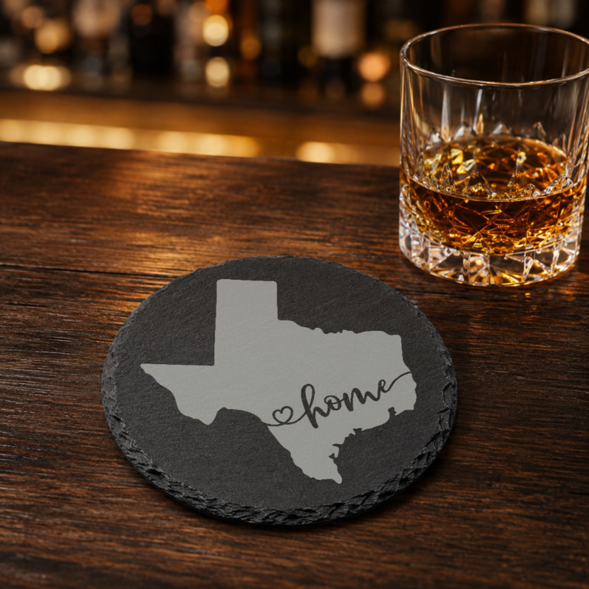 Texas Themed Slate Drink Coasters Bulk Order | Corporate Event Gifts | Conference Swag Bags | Retreat Welcome Kits | Business Events — Dandelion Design Co. — SlateStudioMedia:gallery:19 — 0080-TTGN_texas_themed_slate_drink_coasters_bulk_order_corporate_event_gifts_conference_swag_bags_retreat_welcome_kits_business_events_16_D02_round_whiskey_lifestyle.png