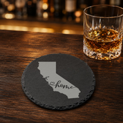California Slate Drink Coaster | Bulk Corporate Event Gift | Conference Gift Bags, Team Meetings, Training Events, Company Retreats — Dandelion Design Co. — SlateStudioMedia:gallery:19 — 0087-CSGN_california_slate_drink_coaster_bulk_corporate_event_gift_conference_gift_bags_team_meetings_training_events_company_retreats_16_D02_round_whiskey_lifestyle.png