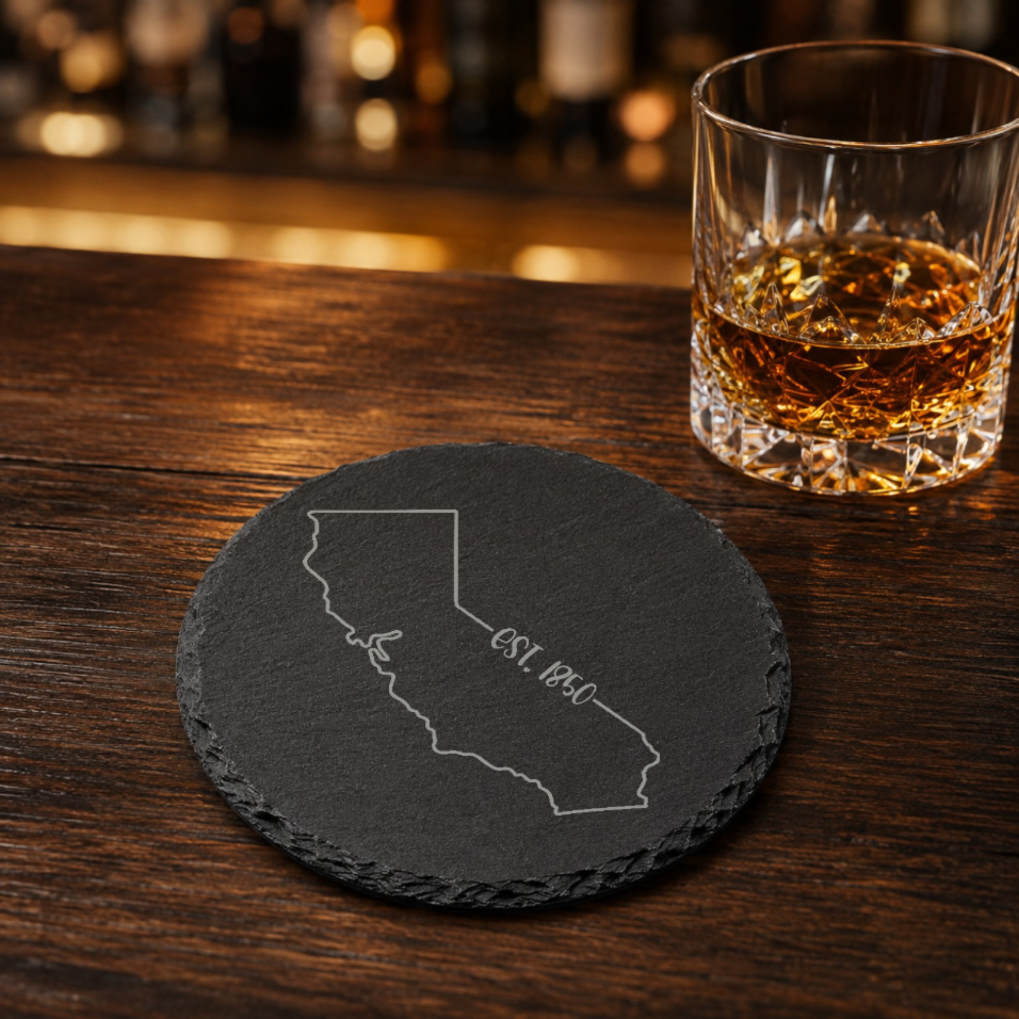 California Slate Drink Coaster | Bulk Corporate Event Gift | Conference Gift Bags, Team Meetings, Training Events, Company Retreats — Dandelion Design Co. — SlateStudioMedia:gallery:21 — 0087-CSGN_california_slate_drink_coaster_bulk_corporate_event_gift_conference_gift_bags_team_meetings_training_events_company_retreats_22_D03_round_whiskey_lifestyle.png