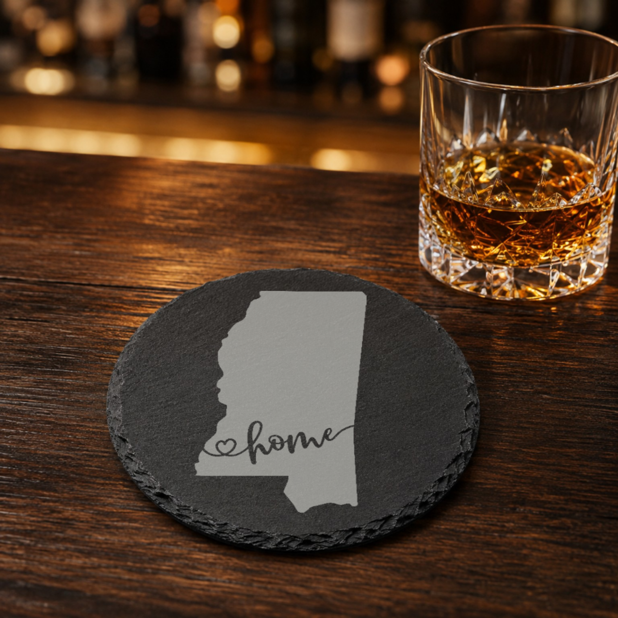 Mississippi Slate Coasters 4x4 Laser Engraved Stone Drink Coasters Mississippi Home Décor Magnolia State Established 1817 Gift — Dandelion Design Co. — SlateStudioMedia:gallery:19 — 0091-MSGN_mississippi_slate_coasters_4x4_laser_engraved_stone_drink_coasters_mississippi_home_d_cor_magnolia_state_established_1817_gift_16_D02_round_whiskey_lifestyle.png