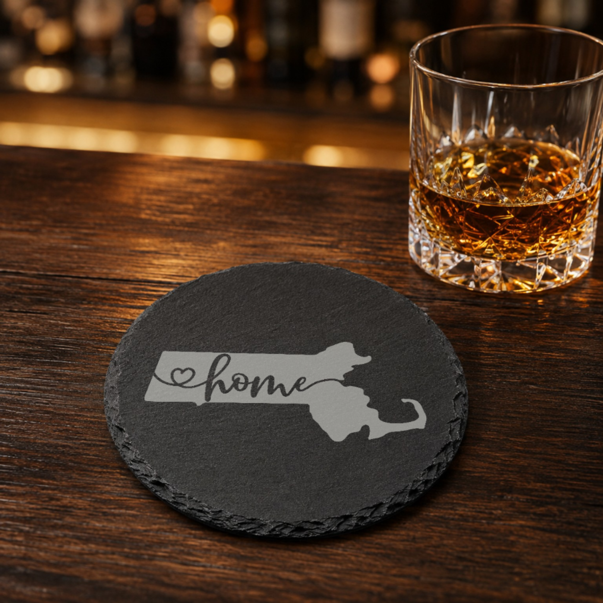 Massachusetts Slate Coasters 4x4 Laser Engraved Stone Drink Coasters Massachusetts Home Décor Bay State Established 1788 Gift — Dandelion Design Co. — SlateStudioMedia:gallery:19 — 0093-MSGN_massachusetts_slate_coasters_4x4_laser_engraved_stone_drink_coasters_massachusetts_home_d_cor_bay_state_established_1788_gift_16_D02_round_whiskey_lifestyle.png
