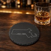 Massachusetts Slate Coasters 4x4 Laser Engraved Stone Drink Coasters Massachusetts Home Décor Bay State Established 1788 Gift — Dandelion Design Co. — SlateStudioMedia:gallery:21 — 0093-MSGN_massachusetts_slate_coasters_4x4_laser_engraved_stone_drink_coasters_massachusetts_home_d_cor_bay_state_established_1788_gift_22_D03_round_whiskey_lifestyle.png