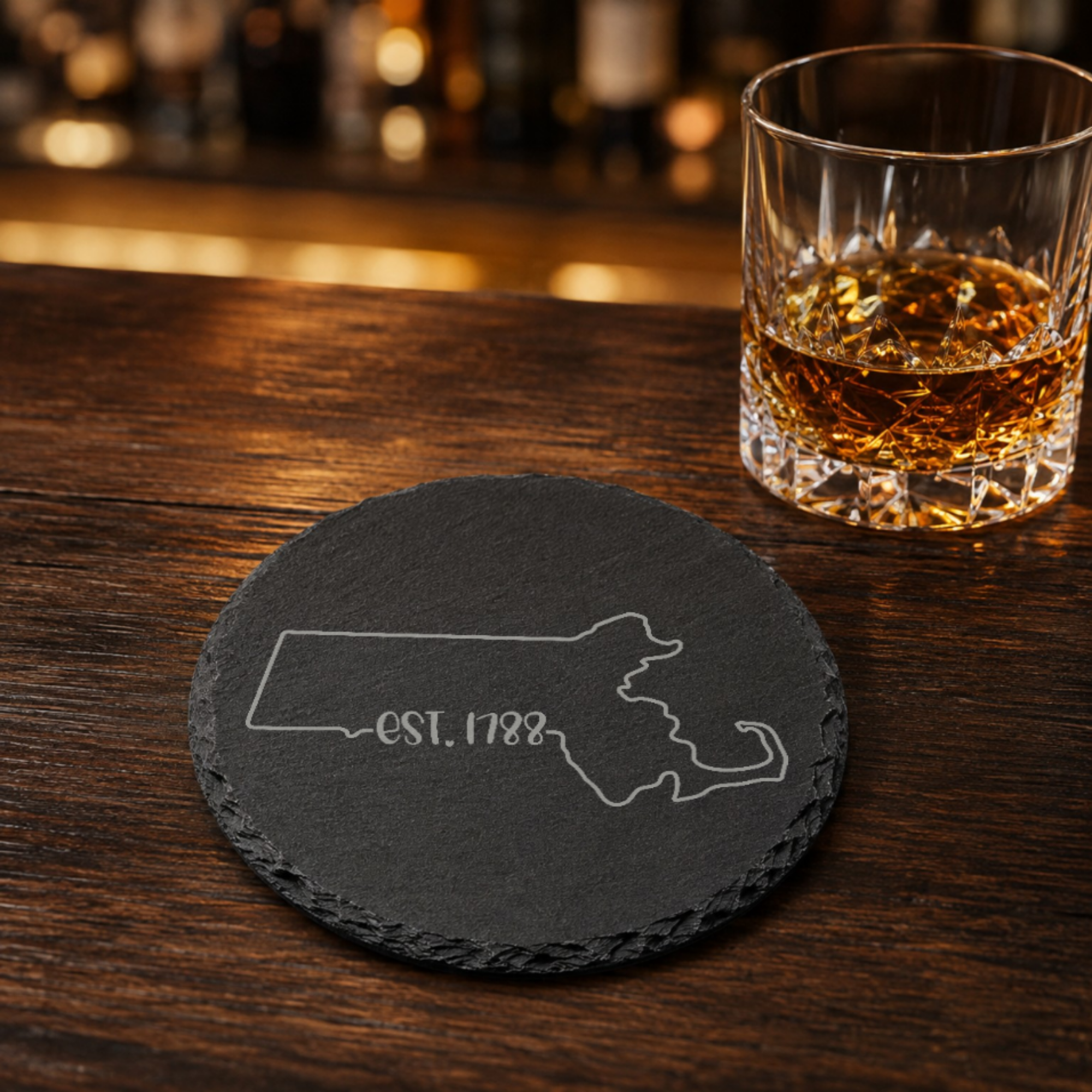 Massachusetts Slate Coasters 4x4 Laser Engraved Stone Drink Coasters Massachusetts Home Décor Bay State Established 1788 Gift — Dandelion Design Co. — SlateStudioMedia:gallery:21 — 0093-MSGN_massachusetts_slate_coasters_4x4_laser_engraved_stone_drink_coasters_massachusetts_home_d_cor_bay_state_established_1788_gift_22_D03_round_whiskey_lifestyle.png