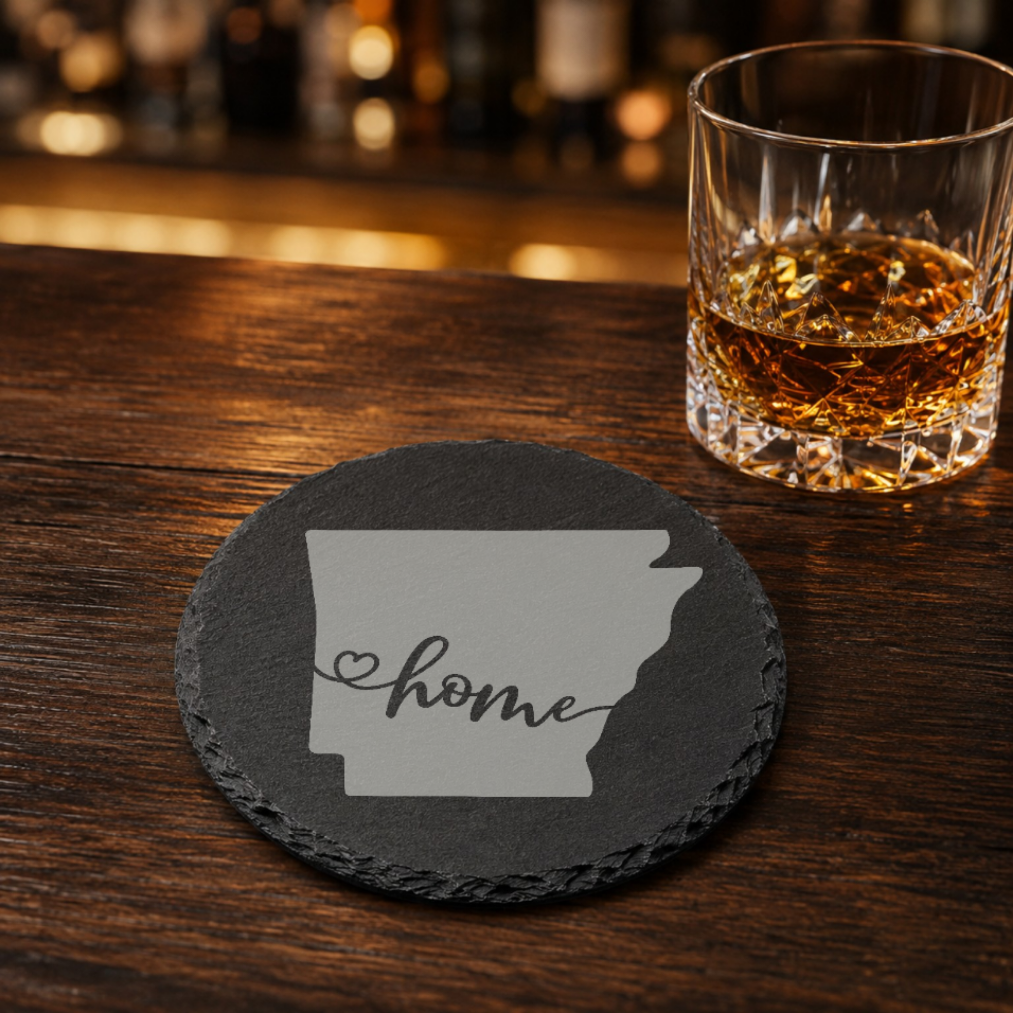 Arkansas Slate Coasters 4x4 Laser Engraved Stone Drink Coasters Arkansas Home Décor Natural State Established 1836 Gift Set — Dandelion Design Co. — SlateStudioMedia:gallery:19 — 0096-ASGN_arkansas_slate_coasters_4x4_laser_engraved_stone_drink_coasters_arkansas_home_d_cor_natural_state_established_1836_gift_set_16_D02_round_whiskey_lifestyle.png