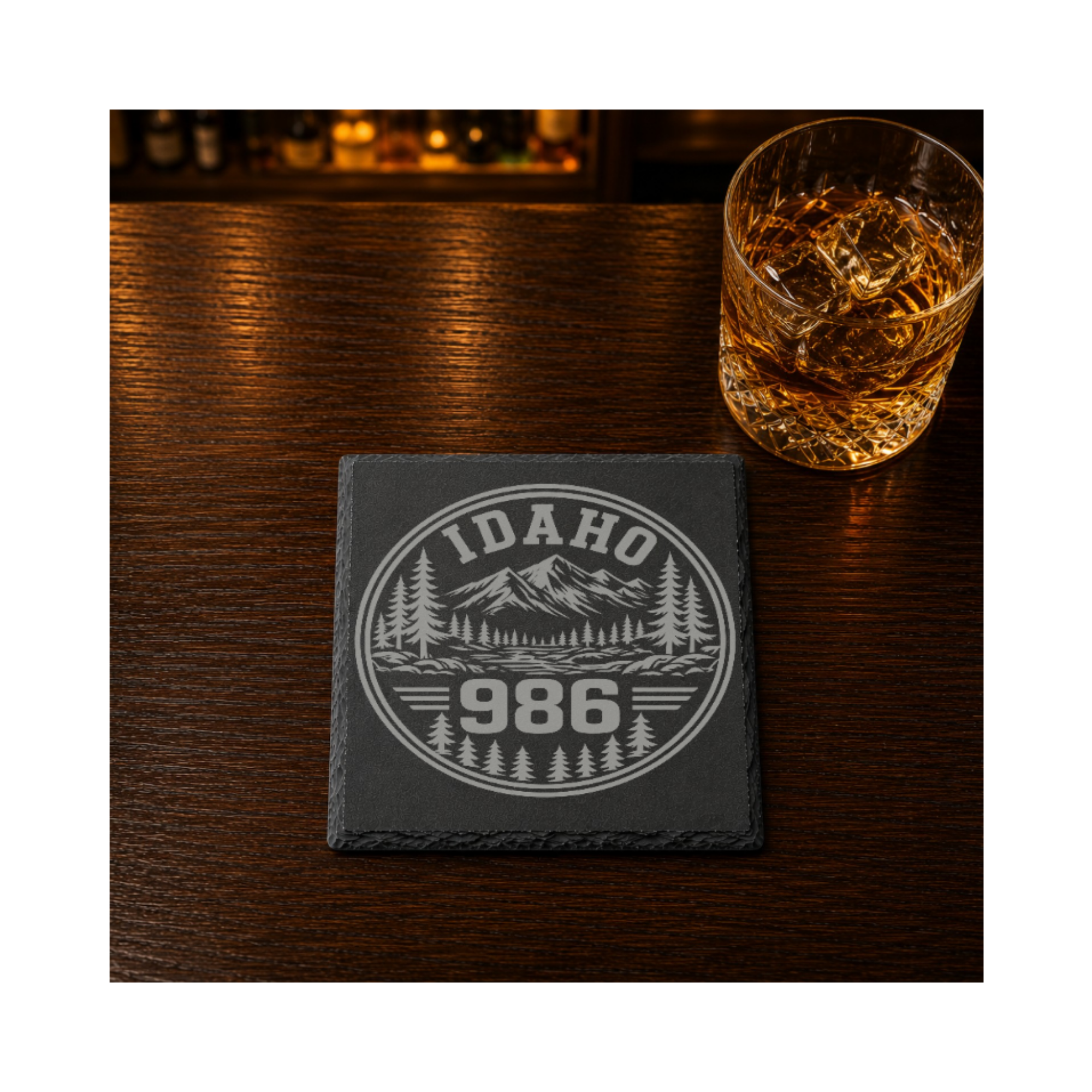 Idaho Area Code Slate Coasters | 208 & 986 Rustic Idaho Gifts | Engraved Mountain Cabin Stone Coasters — Dandelion Design Co. — SlateStudioMedia:gallery:12 — 0098-IAGN_idaho_area_code_slate_coasters_208_986_rustic_idaho_gifts_engraved_mountain_cabin_stone_coasters_07_square_whiskey_lifestyle.png