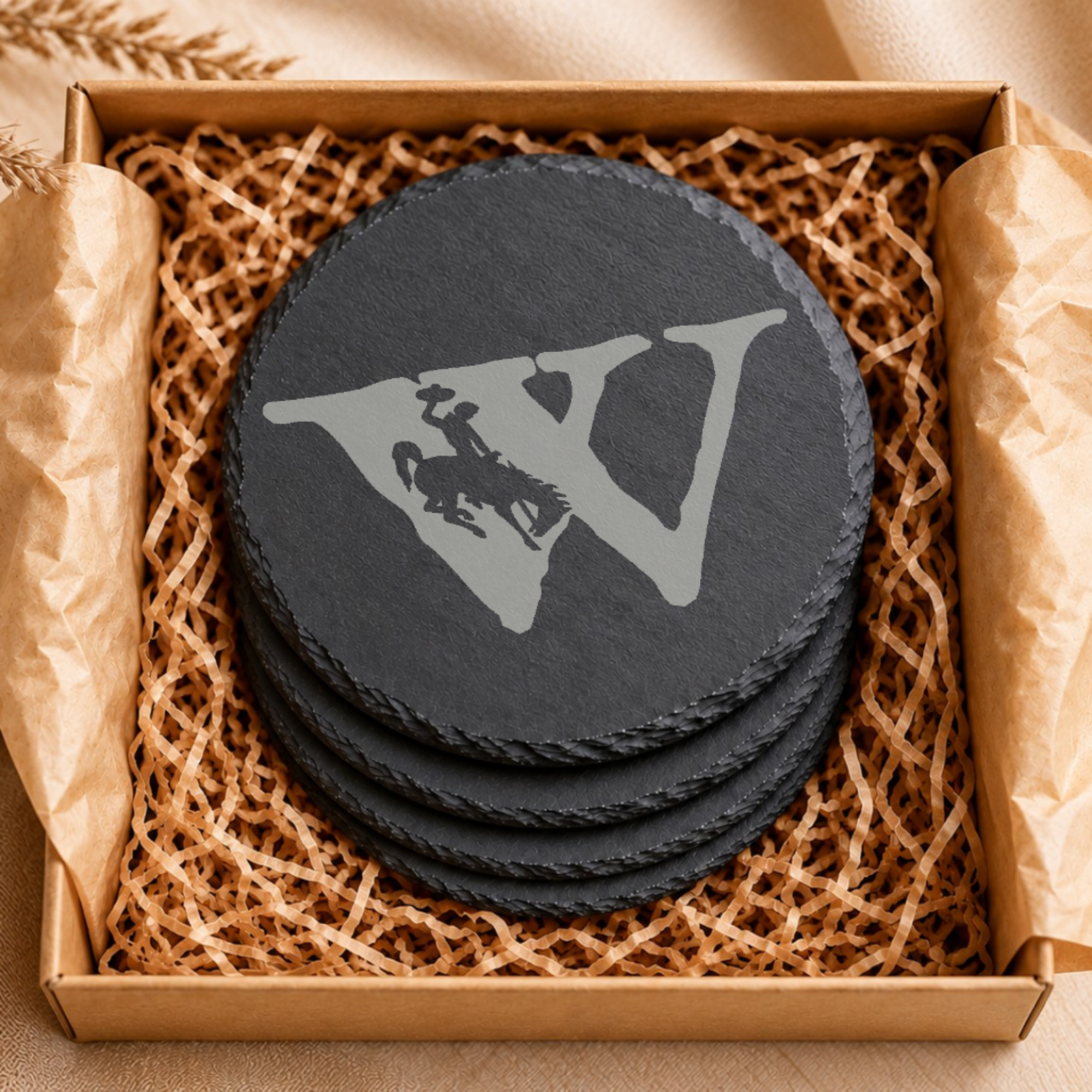 Wyoming Bucking Horse Slate Coaster Set | Set of 4 Steamboat EngravedSlate Coaster Set | Wyoming Cowboys | Drink Coaster | Table Decor — Dandelion Design Co. — SlateStudioMedia:gallery:5 — 0100-WBGN_wyoming_bucking_horse_slate_coaster_set_set_of_4_steamboat_engravedslate_coaster_set_wyoming_cowboys_drink_coaster_table_decor_06_round_gift_box.png