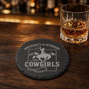University of Wyoming Slate Coaster – "The World Needs More Cowboys" | Laser Engraved | Rustic Cowboy Gift - UW — Dandelion Design Co. — SlateStudioMedia:gallery:13 — 0101-UWGN_university_of_wyoming_slate_coaster_quot_the_world_needs_more_cowboys_quot_laser_engraved_rustic_cowboy_gift_uw_08_round_whiskey_lifestyle.png