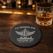 Cheyenne Wyoming Air Force Coaster | F.E. Warren AFB Gift | Military Slate Coaster | Veteran Gift | USAF Inspired Decor | Missile Engraved — Dandelion Design Co. — SlateStudioMedia:gallery:9 — 0103-CWGN_cheyenne_wyoming_air_force_coaster_f_e_warren_afb_gift_military_slate_coaster_veteran_gift_usaf_inspired_decor_missile_engraved_08_round_whiskey_lifestyle.png