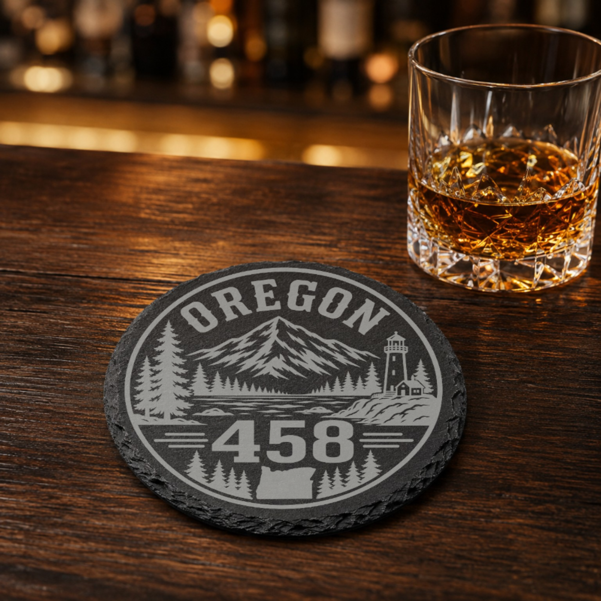 Oregon Area Code Slate Coasters | 503 971 541 458 Oregon Gift | Engraved Rustic Stone Coaster | Pacific Northwest Cabin Decor — Dandelion Design Co. — SlateStudioMedia:gallery:23 — 0104-OAGN_oregon_area_code_slate_coasters_503_971_541_458_oregon_gift_engraved_rustic_stone_coaster_pacific_northwest_cabin_decor_16_D02_round_whiskey_lifestyle.png
