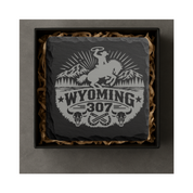 Wyoming 307 Engraved Slate Coaster SetEngraved Slate Coaster Set | Wyoming Cowboys | Drink Coaster | Table Decor — Dandelion Design Co. — SlateStudioMedia:gallery:4 — 0105-W3GN_wyoming_307_engraved_slate_coaster_setengraved_slate_coaster_set_wyoming_cowboys_drink_coaster_table_decor_05_square_gift_box.png