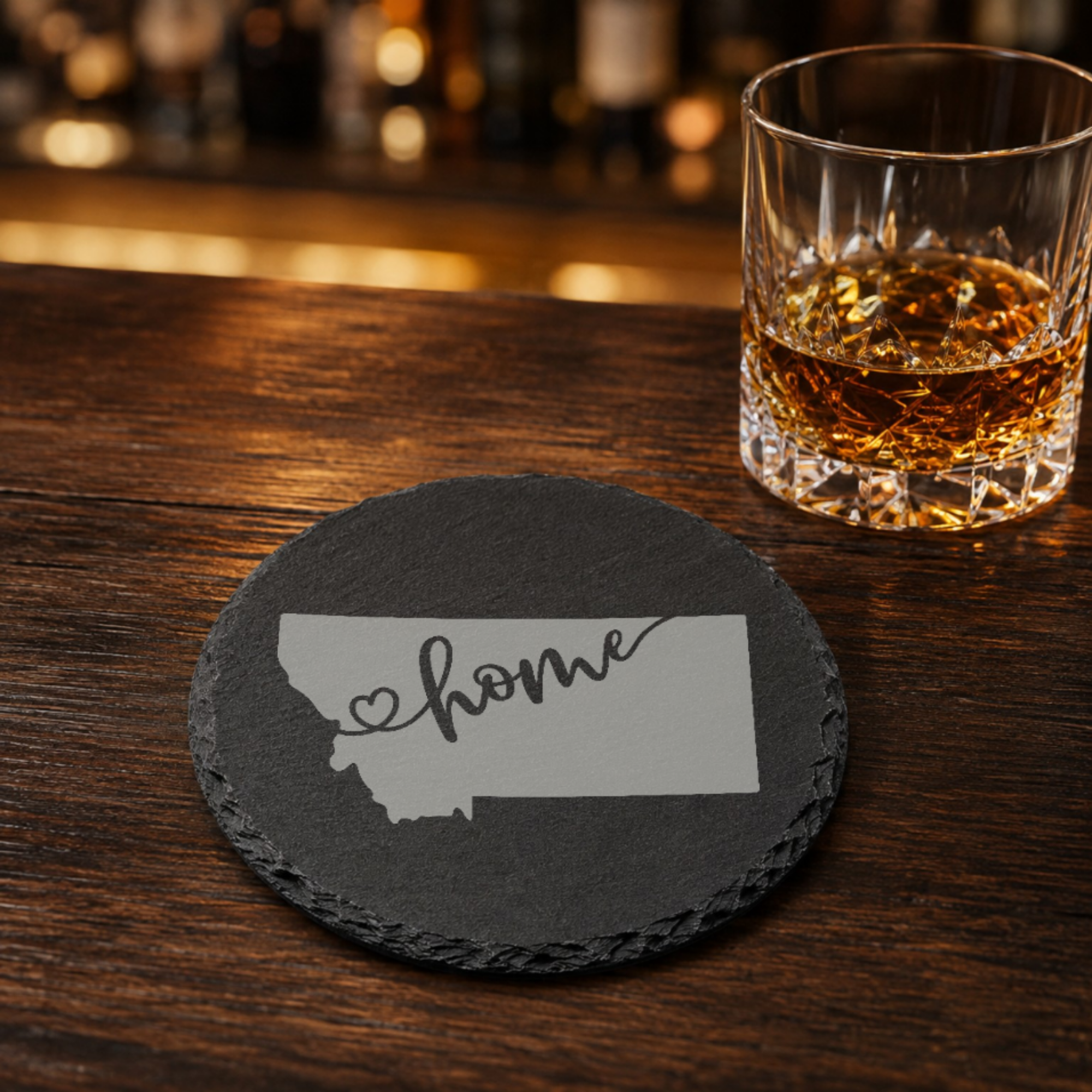 Montana Slate Coasters 4x4 Laser Engraved Stone Drink Coasters Montana Home Décor Treasure State Established 1889 Gift — Dandelion Design Co. — SlateStudioMedia:gallery:23 — 0117-MSGN_montana_slate_coasters_4x4_laser_engraved_stone_drink_coasters_montana_home_d_cor_treasure_state_established_1889_gift_16_D02_round_whiskey_lifestyle.png