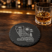 California Slate Coaster - Laser Etched State Design with Golden Gate Bridge, Bear & Sun - Handcrafted Home Decor Gift — Dandelion Design Co. — SlateStudioMedia:gallery:21 — 0119-CSGN_california_slate_coaster_laser_etched_state_design_with_golden_gate_bridge_bear_sun_handcrafted_home_decor_gift_08_round_whiskey_lifestyle.png