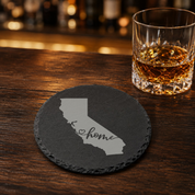 California Slate Coaster - Laser Etched State Design with Golden Gate Bridge, Bear & Sun - Handcrafted Home Decor Gift — Dandelion Design Co. — SlateStudioMedia:gallery:25 — 0119-CSGN_california_slate_coaster_laser_etched_state_design_with_golden_gate_bridge_bear_sun_handcrafted_home_decor_gift_22_D03_round_whiskey_lifestyle.png