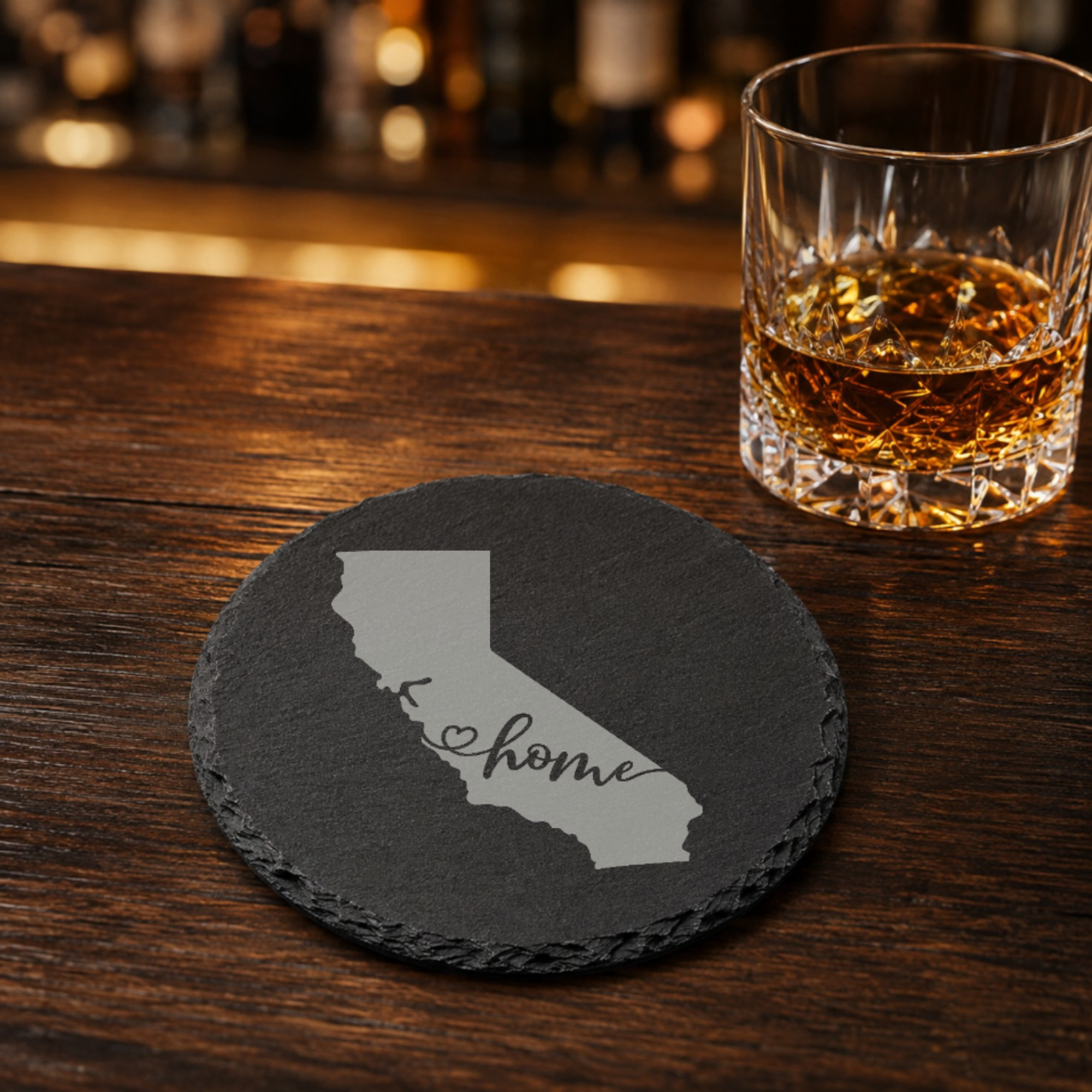 California Slate Coaster - Laser Etched State Design with Golden Gate Bridge, Bear & Sun - Handcrafted Home Decor Gift — Dandelion Design Co. — SlateStudioMedia:gallery:25 — 0119-CSGN_california_slate_coaster_laser_etched_state_design_with_golden_gate_bridge_bear_sun_handcrafted_home_decor_gift_22_D03_round_whiskey_lifestyle.png