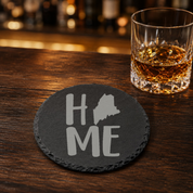 Maine Slate Coasters 4x4 Laser Engraved Stone Drink Coasters Maine Home Décor Pine Tree State Established 1820 Gift — Dandelion Design Co. — SlateStudioMedia:gallery:17 — 0122-MSGN_maine_slate_coasters_4x4_laser_engraved_stone_drink_coasters_maine_home_d_cor_pine_tree_state_established_1820_gift_08_round_whiskey_lifestyle.png