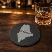 Maine Slate Coasters 4x4 Laser Engraved Stone Drink Coasters Maine Home Décor Pine Tree State Established 1820 Gift — Dandelion Design Co. — SlateStudioMedia:gallery:19 — 0122-MSGN_maine_slate_coasters_4x4_laser_engraved_stone_drink_coasters_maine_home_d_cor_pine_tree_state_established_1820_gift_16_D02_round_whiskey_lifestyle.png